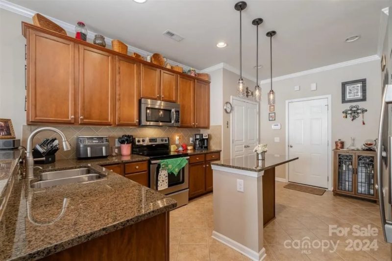 Elegant 3-Story Townhome Blueprint with Spacious Layout