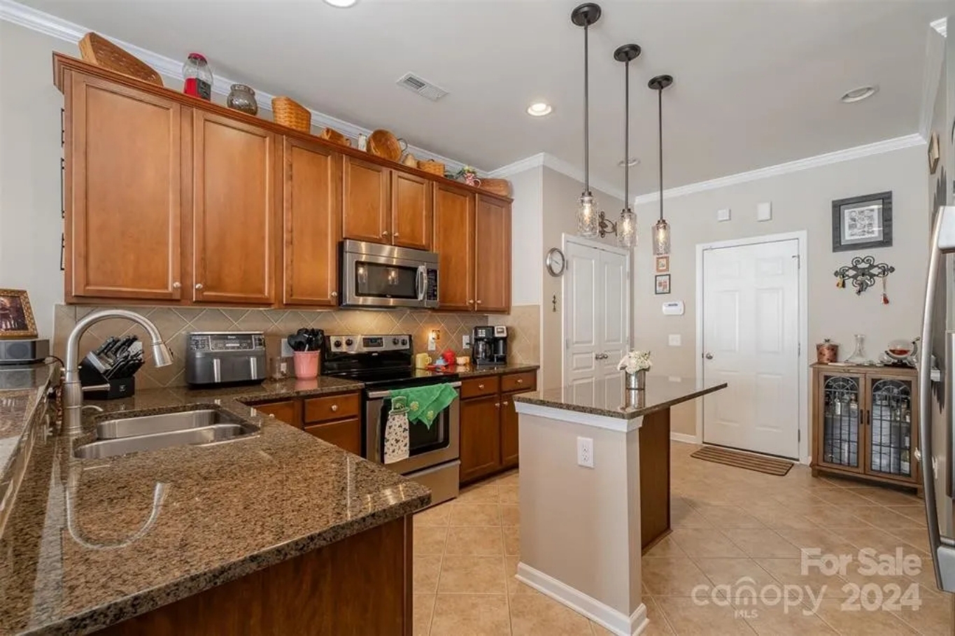 Elegant 3-Story Townhome Blueprint with Spacious Layout