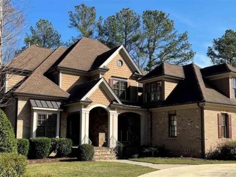 Elegant 2-Story House Plan with Vaulted Ceilings and Outdoor Living