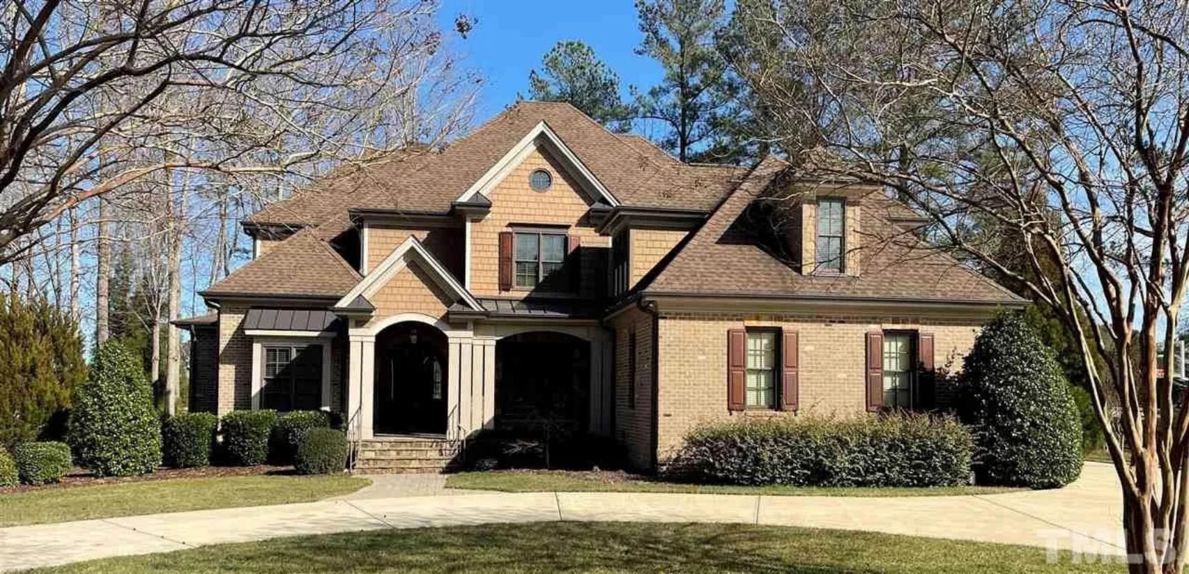 Elegant 2-Story House Plan with Vaulted Ceilings and Outdoor Living