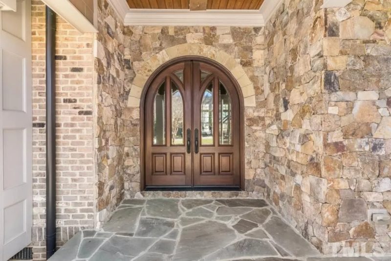 Elegant 2-Story House Plan with Vaulted Ceilings and Outdoor Living