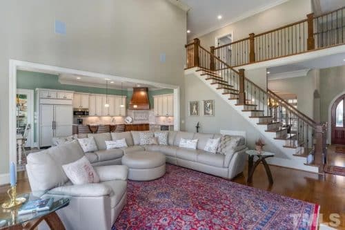 Elegant 2-Story House Plan with Vaulted Ceilings and Outdoor Living