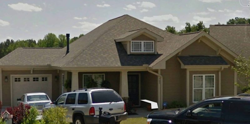 Compact 1-Story Home Plan with Garage and Open Floor Design