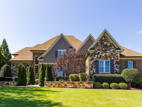 Traditional 4-Bedroom House Plan with Front-Entry Garage