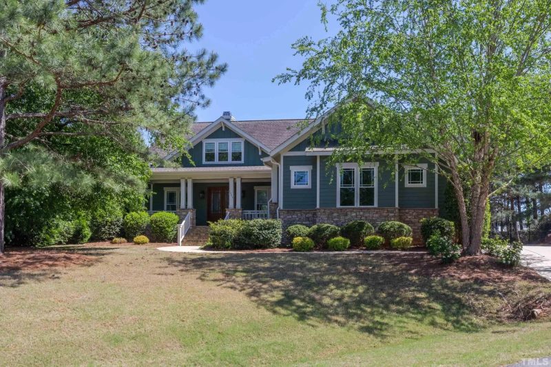 Spacious 1.5-Story Craftsman House Plan with Open Floor Layout