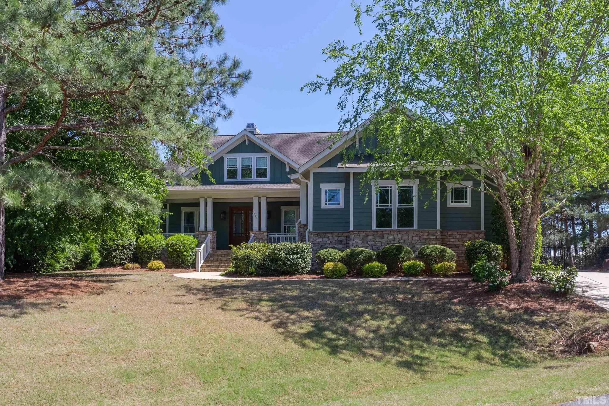 Spacious 1.5-Story Craftsman House Plan with Open Floor Layout