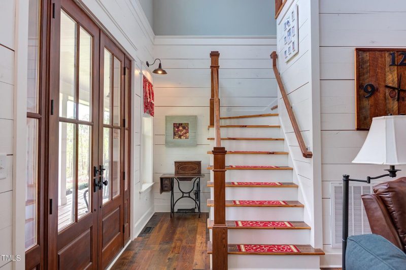 "Image of an elegant traditional farmhouse floor plan showcasing detailed designs and layouts"