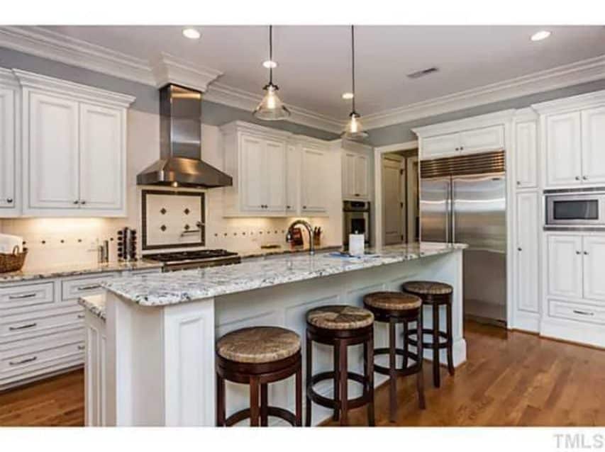 Traditional Craftsman house Plan with 4 Beds,3 Garage Bays,and Vaulted Ceilings