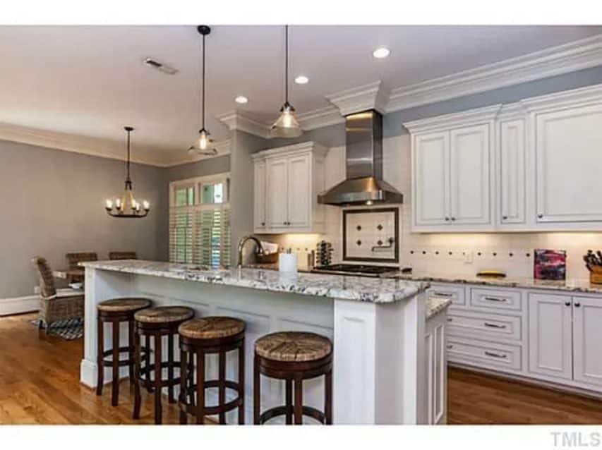 Traditional Craftsman house Plan with 4 Beds,3 Garage Bays,and Vaulted Ceilings