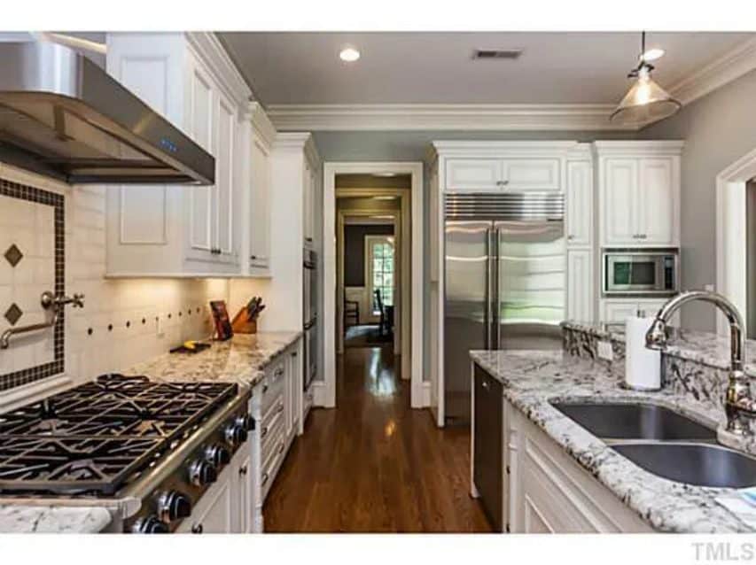 Traditional Craftsman house Plan with 4 Beds,3 Garage Bays,and Vaulted Ceilings