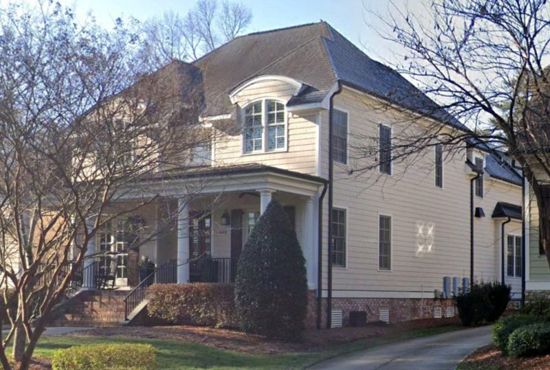 Traditional Craftsman house Plan with 4 Beds, 3 Garage Bays, and Vaulted Ceilings