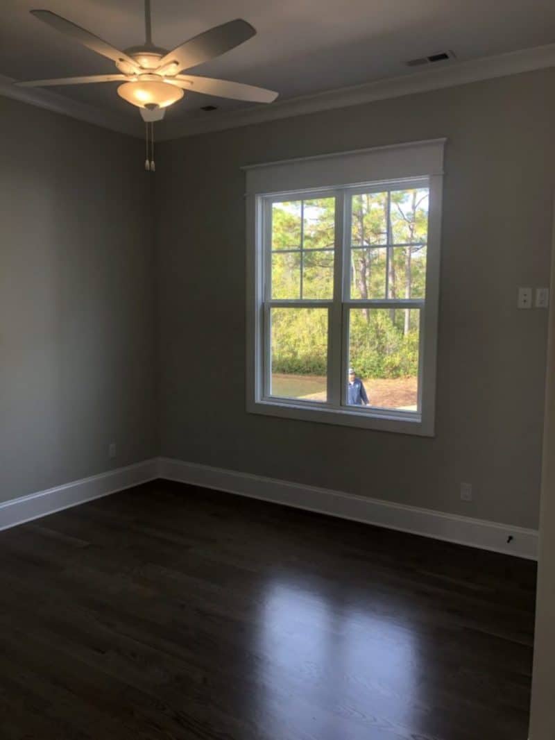 "Modern craftsman house design plan with a spacious floor layout alongside CAD blueprints"
