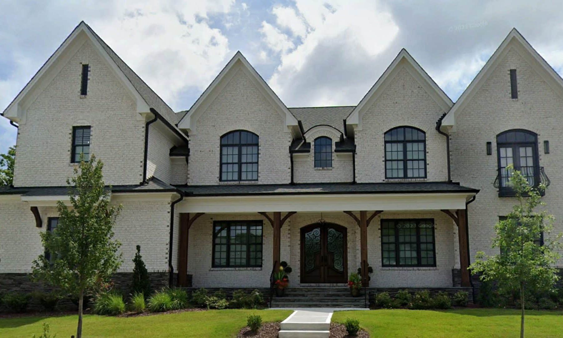 Luxury 2-Story House Plan with 6 Bedrooms & 8 Bathrooms